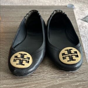 Tory Burch Black Flats with Gold Emblem